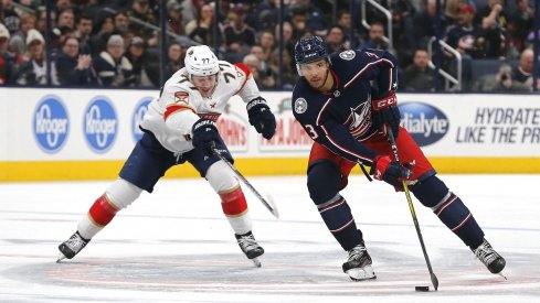 Columbus Blue Jackets defenseman Seth Jones controls the puck against Florida's Frank Vatrano.