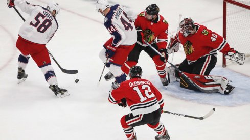 Oct 18, 2019; Chicago, IL, USA; Columbus Blue Jackets defenseman David Savard (58) looks to score against the Chicago Blackhawks during the first period at United Center.