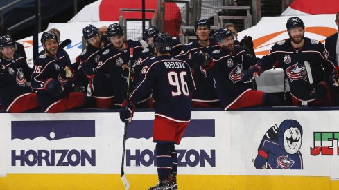 Feb 8, 2021; Columbus, Ohio, USA; Columbus Blue Jackets center Jack Roslovic (96) celebrates a goal against the Carolina Hurricanes during the third period at Nationwide Arena.