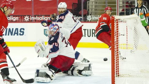 Teuvo Teravainen scores a second period goal past Columbus Blue Jackets goaltender Joonas Korpisalo 