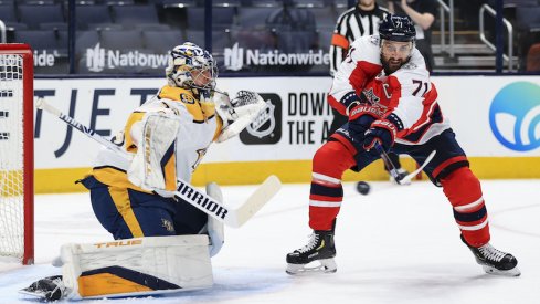 Nashville Predators goaltender Pekka Rinne (35) reacts as Columbus Blue Jackets left wing Nick Foligno (71) deflects the puck in the air in the first period at Nationwide Arena.