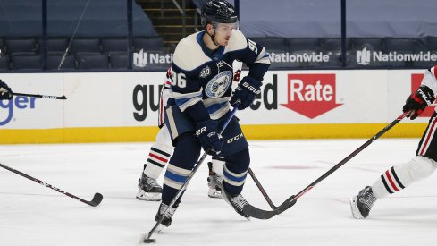 Columbus Blue Jackets center Jack Roslovic (96) stick handles against the Chicago Blackhawks during the third period at Nationwide Arena.