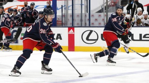 Columbus Blue Jackets center Jack Roslovic (96) controls the puck as he enters the Chicago Blackhawks zone during the first period at Nationwide Arena.