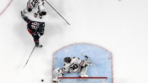 Chicago Blackhawks goalie Malcolm Subban (30) makes a save from the shot of Columbus Blue Jackets center Jack Roslovic (96) during the first period at Nationwide Arena. 