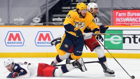  Nashville Predators center Matt Duchene (95) is hit by Columbus Blue Jackets defenseman Zach Werenski (8) and defenseman Seth Jones (3) as he skates toward the net during the third period at Bridgestone Arena.