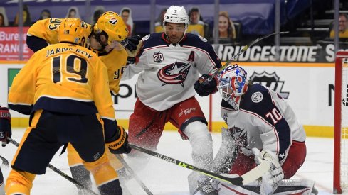 Columbus Blue Jackets goaltender Joonas Korpisalo (70) blocks a shot by Nashville Predators center Matt Duchene (95) during the third period at Bridgestone Arena.