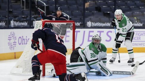 Dallas Stars goaltender Anton Khudobin (35) reacts as Columbus Blue Jackets right wing Cam Atkinson (13) scores a goal in the third period at Nationwide Arena.