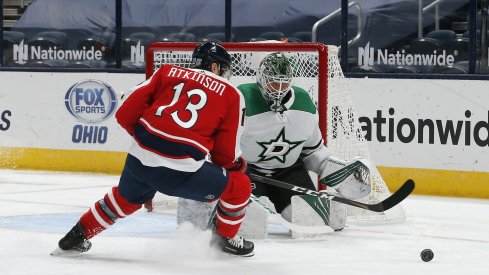 Cam Atkinson looks to bury the puck.