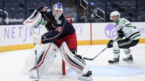 Columbus Blue Jackets goaltender Joonas Korpisalo (70) controls the puck against the Dallas Stars in the second period at Nationwide Arena.