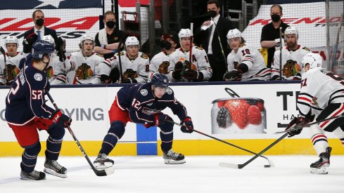 Alexandre Texier and Emil Bemstrom against the Chicago Blackhawks