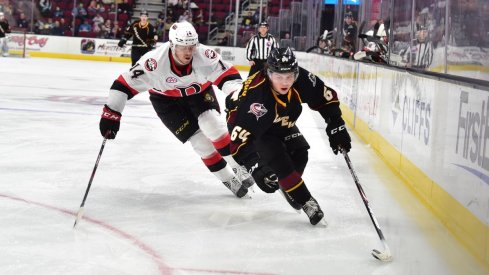 Trey Fix-Wolansky carries the puck.