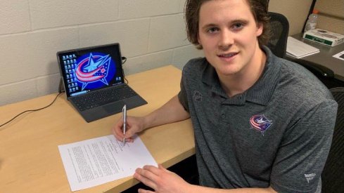 Tyler Angle signs his ELC with the Blue Jackets.
