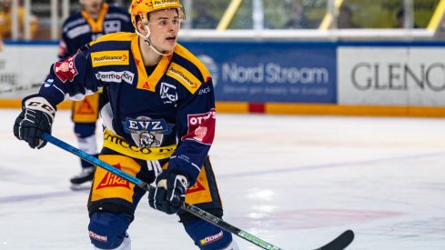 Gregory Hoffman searches for the puck while playing for the Swiss League team EV Zug.