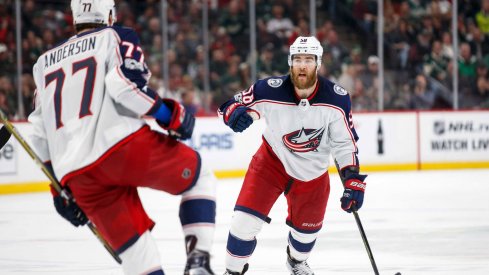 Oct 14, 2017; Saint Paul, MN, USA; Columbus Blue Jackets defenseman David Savard (58) celebrates forward Josh Anderson (77) goal in the third period against the Minnesota Wild at Xcel Energy Center.