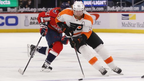 May 8, 2021; Washington, District of Columbia, USA; Philadelphia Flyers right wing Jakub Voracek (93) skates with the puck as Washington Capitals left wing Carl Hagelin (62) chases in the third period at Capital One Arena.