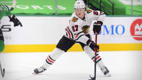 Mar 9, 2021; Dallas, Texas, USA; Chicago Blackhawks defenseman Adam Boqvist (27) in action during the game between the Dallas Stars and the Chicago Blackhawks at the American Airlines Center.