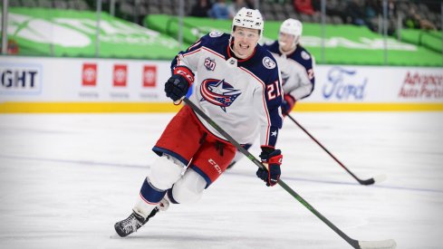 Apr 15, 2021; Dallas, Texas, USA; Columbus Blue Jackets rookie center Josh Dunne (21) skates in his first NHL game during the second period against the Dallas Stars at the American Airlines Center.
