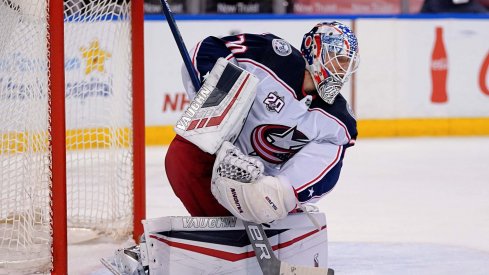 Apr 4, 2021; Sunrise, Florida, USA; Columbus Blue Jackets goaltender Joonas Korpisalo (70) blocks the puck against the Florida Panthers during the second period at BB&T Center.