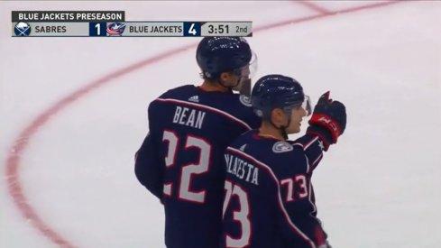 Columbus Blue Jackets' Yegor Chinakhov (59) celebrates with Cole Sillinger  after scoring during the first period of an NHL exhibition hockey game  against the Pittsburgh Penguins in Pittsburgh, Monday, Sept. 27, 2021. (