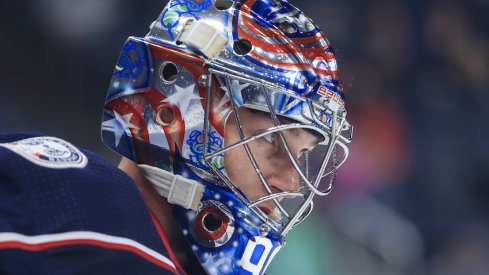 Columbus Blue Jackets goaltender Elvis Merzlikins (90) skates on the ice during a stop in play against the Chicago Blackhawks in the second period at Nationwide Arena
