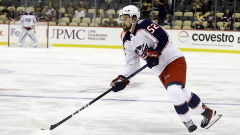 Sep 27, 2021; Pittsburgh, Pennsylvania, USA; Columbus Blue Jackets center Emil Bemstrom (52) skates with the puck against the Pittsburgh Penguins during the second period at PPG Paints Arena.