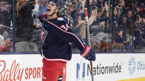 Oct 21, 2021; Columbus, Ohio, USA; Columbus Blue Jackets center Cole Sillinger (34) celebrates after scoring a goal against the New York Islanders in the second period at Nationwide Arena.