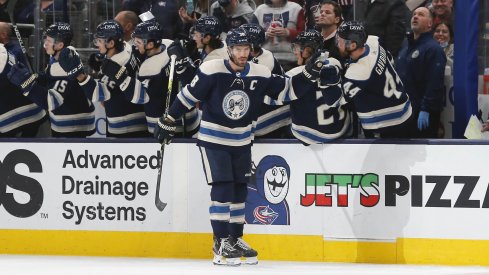 Oct 23, 2021; Columbus, Ohio, USA; Columbus Blue Jackets center Boone Jenner (38) celebrates a goal against the Carolina Hurricanes during the second period at Nationwide Arena.