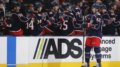 Oct 25, 2021; Columbus, Ohio, USA; Columbus Blue Jackets center Alexandre Texier (42) celebrates a goal during the third period against the Dallas Stars at Nationwide Arena.