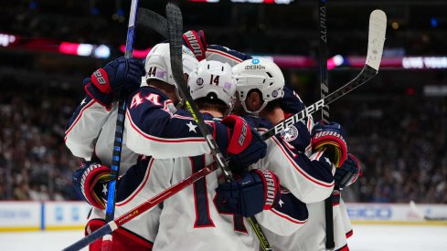 Members of the Columbus Blue Jackets celebrate a goal in the third period against the Colorado Avalanche at Ball Arena.
