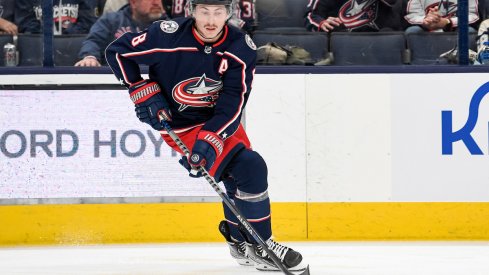 Columbus Blue Jackets defenseman Zach Werenski (8) moves the puck in the second period against the New York Rangers at Nationwide Arena.