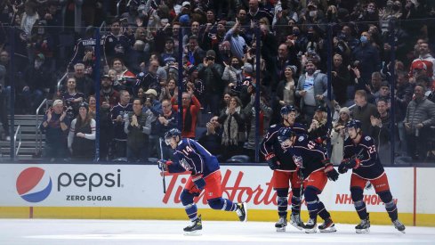 Nov 26, 2021; Columbus, Ohio, USA; Columbus Blue Jackets center Gustav Nyquist (14) celebrates with teammates after scoring a goal against the Vancouver Canucks in the first period at Nationwide Arena.