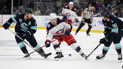 Max Domi of the Columbus Blue Jackets passes the puck against the Seattle Kraken at Climate Pledge Arena.