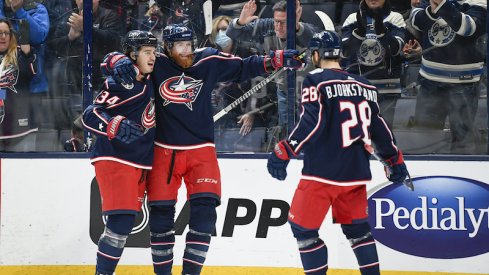 Columbus Blue Jackets' Jake Voracek celebrates his first period power play goal with Oliver Bjorkstrand and Cole Sillinger against the New York Rangers at Nationwide Arena.