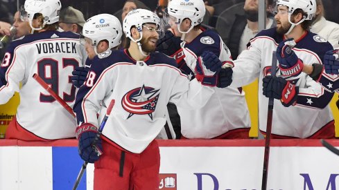 Jan 20, 2022; Philadelphia, Pennsylvania, USA; Columbus Blue Jackets right wing Oliver Bjorkstrand (28) celebrates his goal with teammates against the Philadelphia Flyers during the second period at Wells Fargo Center.