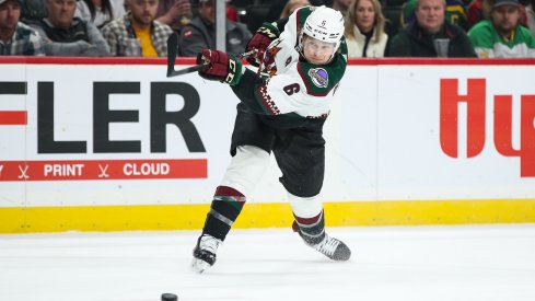 Arizona Coyotes defenseman Jakob Chychrun shoots the puck