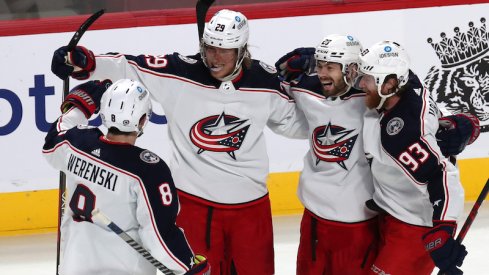 Columbus Blue Jackets' Patrik Laine celebrates his game-winning goal against the Montreal Canadiens at Bell Centre.