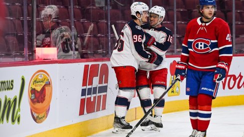 Max Domi and Jack Roslovic celebrate a goal