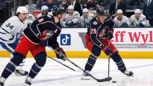 Columbus Blue Jackets Patrik Laine carries the puck up ice against the Toronto Maple Leafs in the first period.