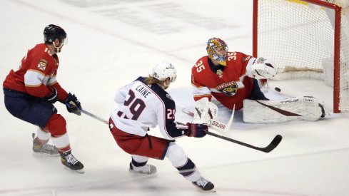 Feb 24, 2022; Sunrise, Florida, USA; Columbus Blue Jackets left wing Patrik Laine (29) scores a goal on Florida Panthers goaltender Jonas Johansson (35) during the first period at FLA Live Arena.