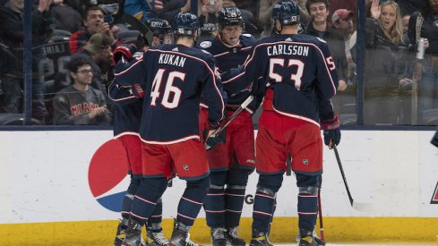 Columbus Blue Jackets players celebrate a goal against the St. Louis Blues at Nationwide Arena.