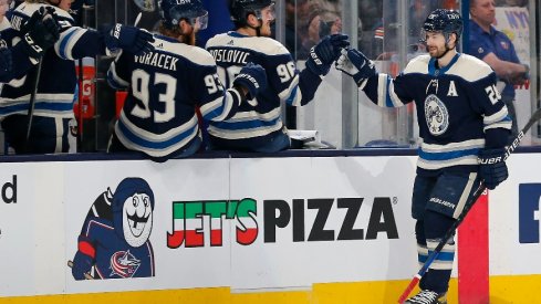 Mar 29, 2022; Columbus, Ohio, USA; Columbus Blue Jackets right wing Oliver Bjorkstrand (28) celebrates a goal against the New York Islanders during the third period at Nationwide Arena.