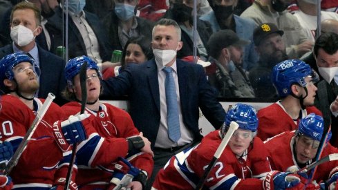 Apr 11, 2022; Montreal, Quebec, CAN; Montreal Canadiens head coach Martin St-Louis looks on during the first period against the Winnipeg Jets at the Bell Centre.