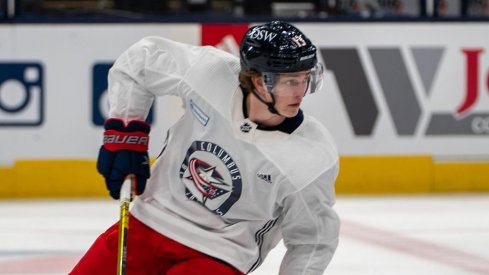 Kent Johnson takes part in his first practice with the Columbus Blue Jackets at Nationwide Arena