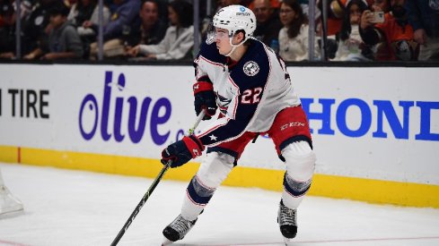 Apr 17, 2022; Anaheim, California, USA; Columbus Blue Jackets defenseman Jake Bean (22) controls the puck against the Anaheim Ducks during the second period at Honda Center.