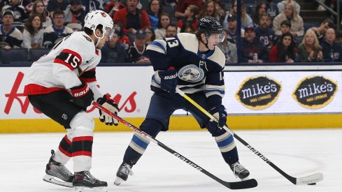  Kent Johnson passes the puck during the second period at Nationwide Arena