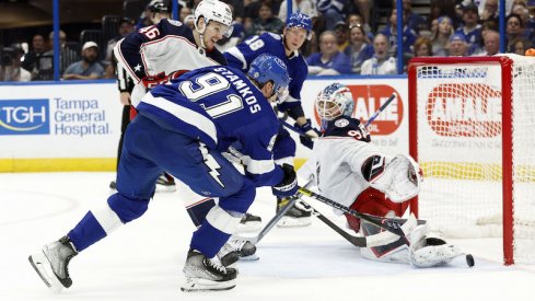 Tampa Bay Lightning's Steven Stamkos shoots on goal as Columbus Blue Jackets goaltender Elvis Merzlikins defends during the first period at Amalie Arena.