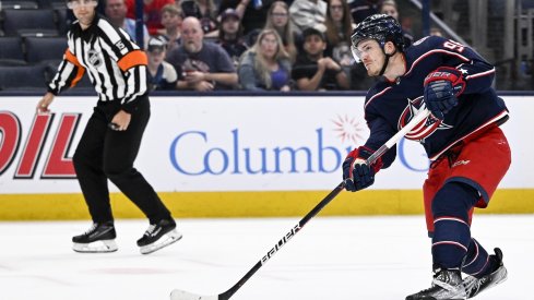 Jack Roslovic shoots and scores against the Edmonton Oilers