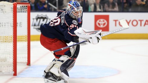 Columbus Blue Jackets' Elvis Merzlikins deflects the puck against the Tampa Bay Lightning at Nationwide Arena.