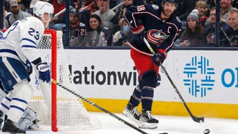 Columbus Blue Jackets center Boone Jenner passes the puck against the Toronto Maple Leafs during the first period at Nationwide Arena.