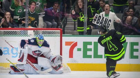 Daniil Tarasov stops a shot by Dallas Stars defenseman Miro Heiskanen